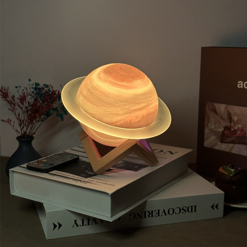NNEDSZ Yellow 3D Saturn Ring Bluetooth Speaker with Adjustable LED Lights, HiFi Bass, USB Charging, and Immersive Sound for Home and Desktop Use