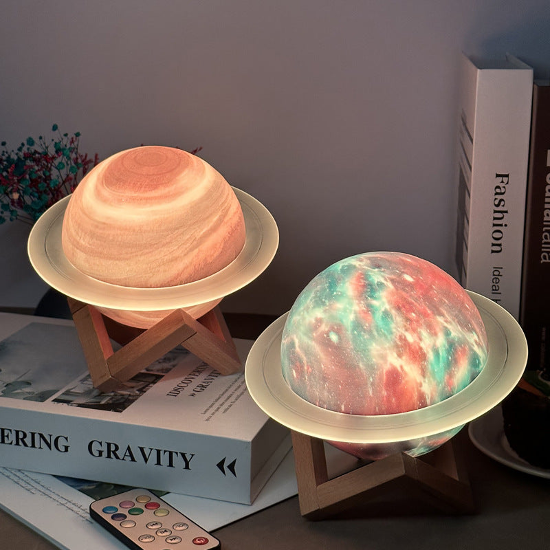 NNEDSZ Yellow 3D Saturn Ring Bluetooth Speaker with Adjustable LED Lights, HiFi Bass, USB Charging, and Immersive Sound for Home and Desktop Use